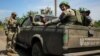 Ukrainian soldiers are seen near the front line in the village of Neskuchne in Ukraine's Donetsk region, newly liberated from the Russian Army, on June 13.