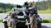 Soldiers participate in a maintenance training on Leopard 1A5 tanks for Ukrainian soldiers at the German Army's Bundeswehr base in Klietz, Germany, on May 5. 