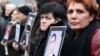 Armenia -- Relatives hold up pictures of Armenians killed in the March 2008 clashes in Yerevan during an opposition rally.