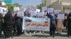 Rallies were held on May 1 in more than a dozen cities.