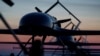 Long-range drones of Ukraine's defense intelligence stand in line before takeoff at an undisclosed location.