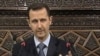 Сирия президенти Башар ал-Ассад парламентте сүйлөп жатат, 30-март.