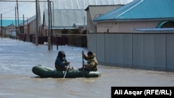 According to Kazakh authorities, almost 2,000 buildings were destroyed floods in the north of the country. 