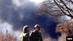 Pamje nga djegia e pikës kufitare në Jarinë, 19 shkurt 2008. 