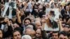 Iranian protesters rally in support of Naser Malek Motiee.