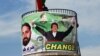 A Pakistani policeman stands guard on top of a water tank during an election campaign meeting by cricket legend and Pakistan Tehrik-e Insaaf party leader Imran Khan in the northwestern town of Mansehra on May 3.