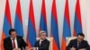 Armenia - President Serzh Sarkisian (C), Prosperous Armenia Party leader Gagik Tsarukian (L) and Oriants Yerkir Party leader Artur Baghdasarian sign a joint declaration in Yerevan, 17Fen2011.