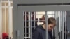 Defendants Ihar Karytski and Dzmitry Veratsenski in court in Minsk in March