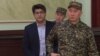 Former Kazakh Economy Minister Quandyq Bishimbaev at his trial in Astana on January 8.