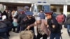 Полиция задерживает участников акции протеста «ипотечников». Астана, 1 октября 2013 года. 