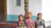 Many young Tajik girls wear headscarves, though wearing them to school is now banned in Tajikistan (