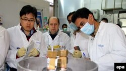 An IAEA team checks the enrichment process inside Iran's uranium enrichment plant in Natanz. (file photo)
