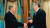 Kazakh President Nursultan Nazarbaev (left) and Viktor Khrapunov