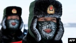 Китайські прикордонники під час навчань в провінції Хейлунцзян на кордоні з Росією. 12 грудня 2016 року