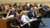 The Serbian member of the Presidency of Bosnia-Herzegovina, Milorad Dodik (center, turned), attends the National Assembly of Republika Srpska session on November 11.