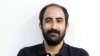 Amir-Abbas Azarmvand worked for the state-run financial newspaper SMT.
