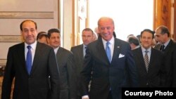 Ирактын өкмөт башчысы Нури ал-Малики жана АКШ вице-президенти Жозеф Байден Багдаддагы жолугушуулар маалында. 