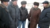 Члены инициативной группы шахтеров-инвалидов, подавшие в суд на корпорацию "Казахмыс", во главе с председателем НПО "Единство" Абильдой Абдикаримовым (второй справа). Караганда, 11 января 2012 года.