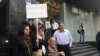 Nasrin Sotoudeh (holding sign) demonstrates in front of Iran's Bar Association in October.