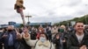 Marchers rally in support of Svyatlana Tsikhanouskaya's candidacy for president in Minsk on May 31. 