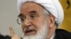 Mehdi Karrubi speaks during a press conference in Tehran in 2008.