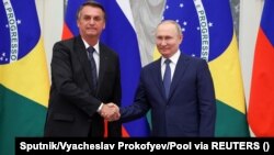 Експрезидент Бразилії Жаїр Болсонару (л) із російським колегою Володимиром Путіним, архівне фото