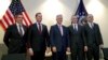 Serbia's Milun Trivunac (left to right), U.S. envoys Richard Grenell and Robert C. O'Brien, Eurowings managing director Michael Knitter, and Kosovo's Eset Berisha pose for a photo at a press conference in Berlin on January 20.
