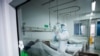 Medical staff in Wuhan, China, where the city is under lockdown. 