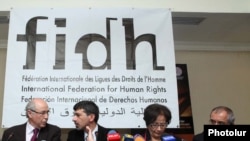 Armenia -- Armenian and Turkish human rights activists present a joint statement in Yerevan, 9 April 2010.