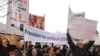 Armenia -- Opposition supporters demonstrate during a visit to Yerevan by Thomas Hammarberg, the Council of Europe's commissioner for human rights, 18Jan2011.