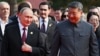 Russian President Vladimir Putin and Chinese President Xi Jinping arrive at a military parade in Beijing on September 3.
