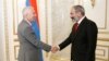 Armenian Prime Minister Nikol Pashinian (right) meets with Piotr Switalski, the head of an EU delegation visiting Yerevan on June 5.