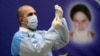 An Iranian health official fills a syringe with Russia's Sputnik V vaccine at Imam Khomeini Hospital in Tehran on February 9.