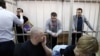 Фигуранты "Болотного дела" в суде (слева направо): Александр Марголин, Алексей Гаскаров, Илья Гущин