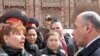 Armenia -- National police chief Alik Sargsian (R) argues with opposition MP Zaruhi Postanjian outside the government building in Yerevan, 10Mar2011.