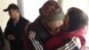 Пастор Бахтжан Кашкумбаев (в центре) у входа в СИЗО Астаны. 8 октября 2013 года.