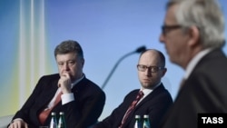 Петр Порошенко, Арсений Яценюк и Жан-Клод Юнкер 
