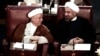 Former Iranian President Akbar Hashemi Rafsanjani (left) chats with current President Hassan Rohani during a session of the Assembly of Experts in Tehran on September 3.